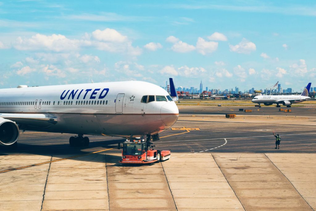 Best Use of United Miles featured by top US travel hacker, Points with Q: Image of United Airlines Plane