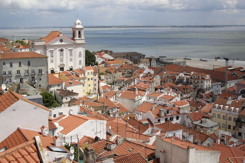 5 Ways to Redeem Capital One Miles with Airline Partners featured by top US travel hacker, Points with Q: image of Lisbon