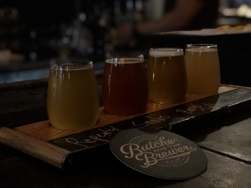 Top 10 Best Things to Do in Cleveland in 2 Days featured by top US travel blog, Points with Q: image of Butcher and the Brewer Beer Flight