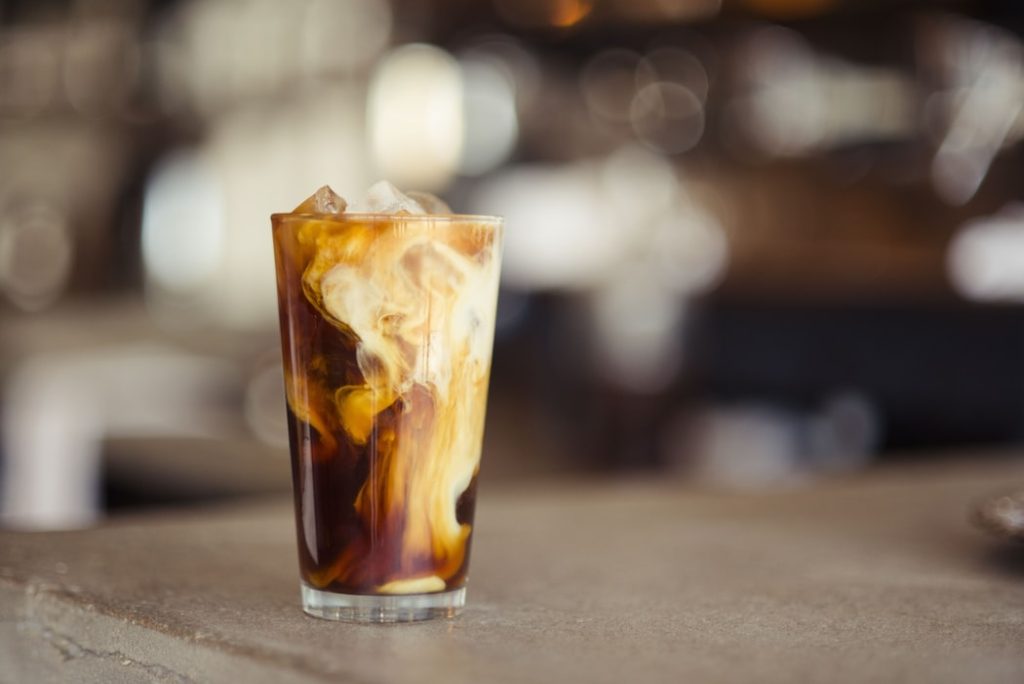 How to Train for a Half Marathon for Beginners featured by top US travel blog, Points with Q: image of Cold Brew Coffee