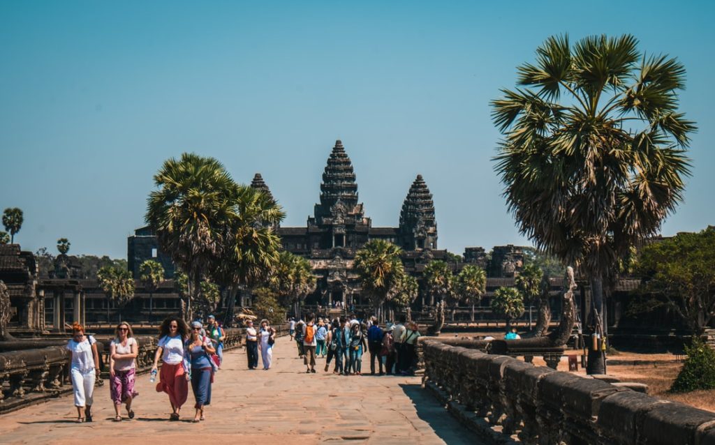 Best Ways to Fly to Asia featured by top US travel hacker, Points with Q: Image of Angkor Wat Cambodia