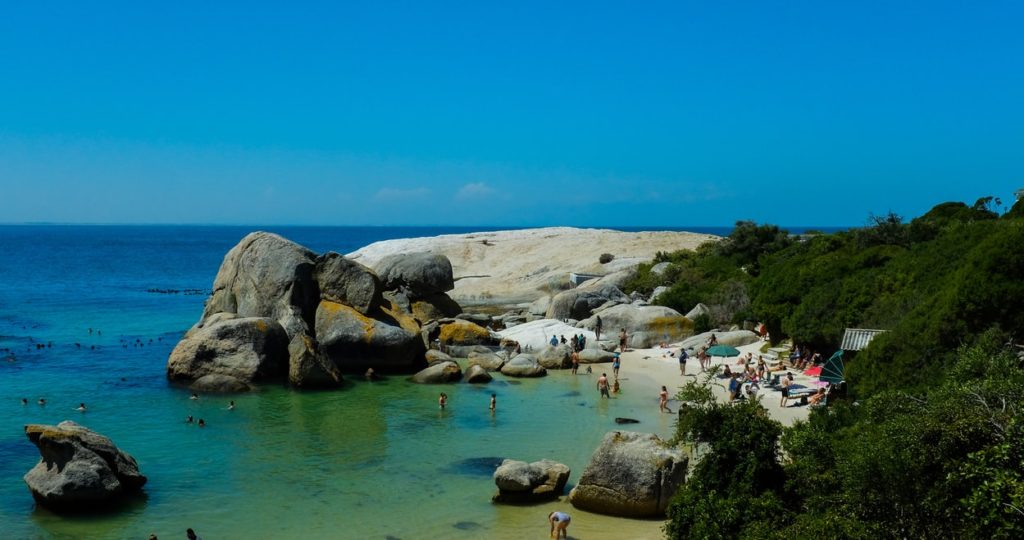 Best Ways to Fly to South Africa featured by top US travel hacker, Points with Q: Image of Boulders Beach Cape Town South Africa