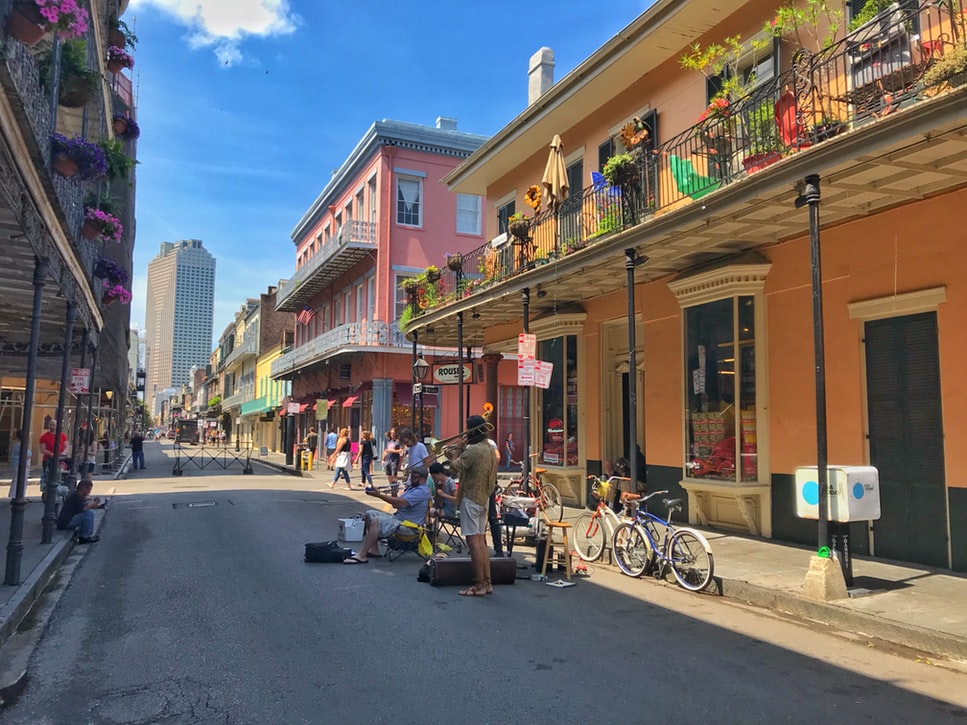 Best US cities to Spend New Years Eve in featured by top US travel hacker, Points with Q: Image of French Quarter New Orleans