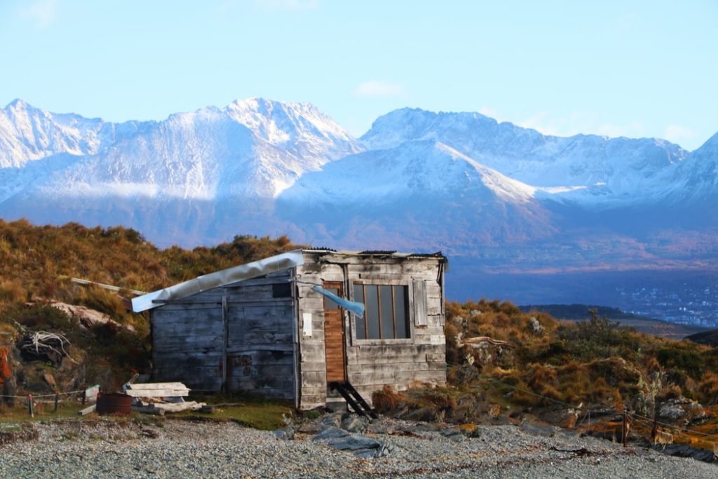 Best Ways to Fly to Southern South America featured by top US travel hacker, Points with Q: Image of Ushuaia Argentina