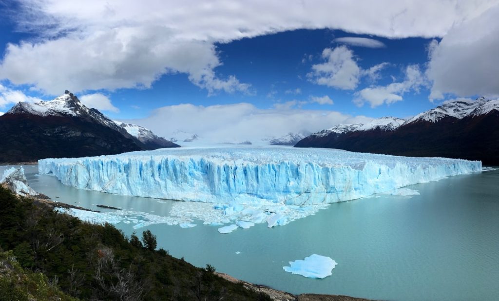 Best Ways to Fly to Southern South America featured by top US travel hacker, Points with Q: Image of Perito Moreno Glacier Argentina