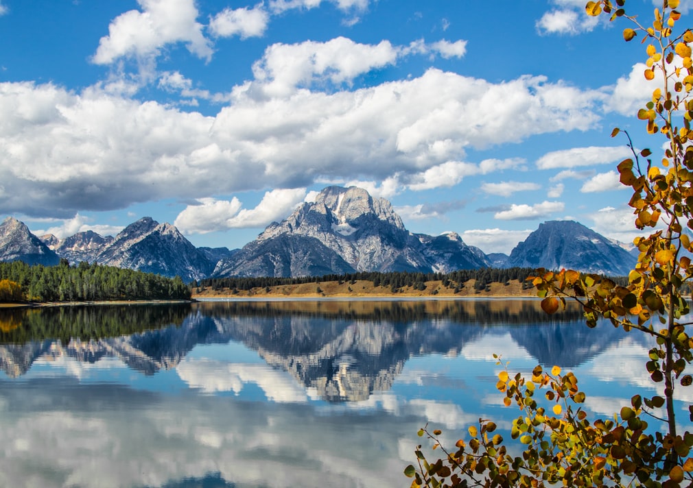 Citi Prestige Card review featured by top US travel hacker, Points with Q: image of Jackson Hole Wyoming Fall Reflection