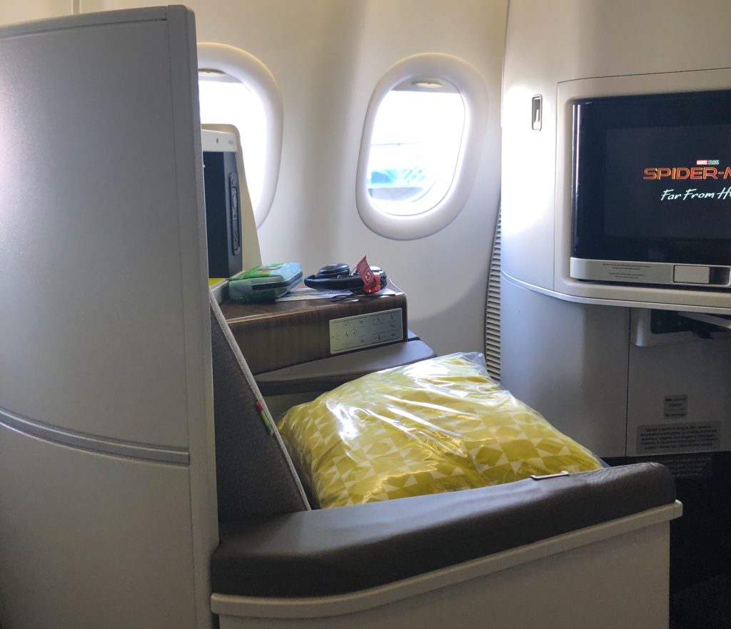 48 Hours of Portugal Travel: A Complete Lisbon Travel Guide featured by top US travel blog, Points with Q: Image of TAP Portugal a330-900neo Business Class
