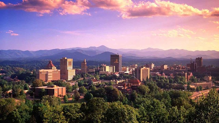Best US cities to Spend New Years Eve in featured by top US travel hacker, Points with Q: Image of Asheville North Carolina Downtown