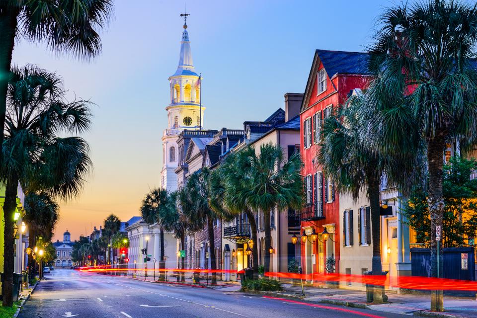 Best US cities to Spend New Years Eve in featured by top US travel hacker, Points with Q: Image of Charleston South Carolina Downtown Buildings