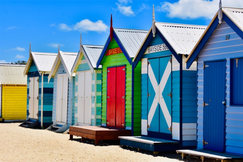 5 Best Ways To Use Cathay Pacific Asia Miles Update featured by top US travel hacking blog, Points with Q: image of Brighton Bathing Boxes Melbourne Australia