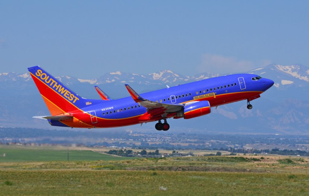 Nashville Travel: A 48-Hour Nashville Vacation featured by top US travel blog Points With Q, image: Denver Airport Southwest Plane Taking Off