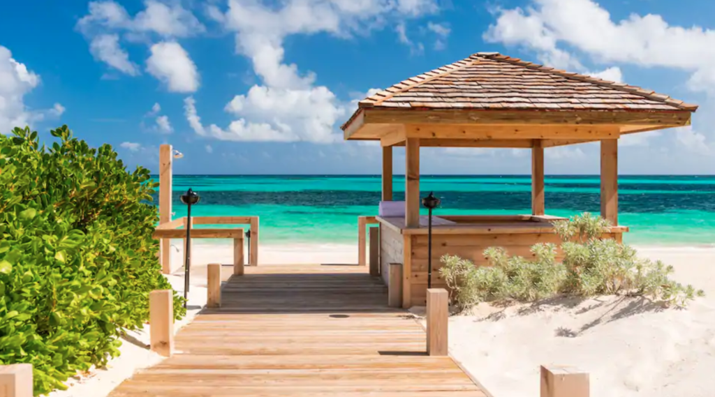 Turks and Caicos Travel Guide featured by top US travel hacker, Points with Q: image of Sailrock Resort Beach Boardwalk
