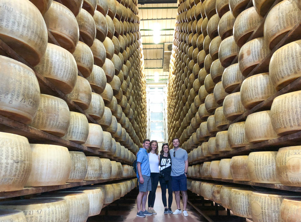 What to Do in Parma Italy: a Complete Travel Guide featured by top travel blog, Points with Q: image of Parma Italy Parmesan Cheese Wheels