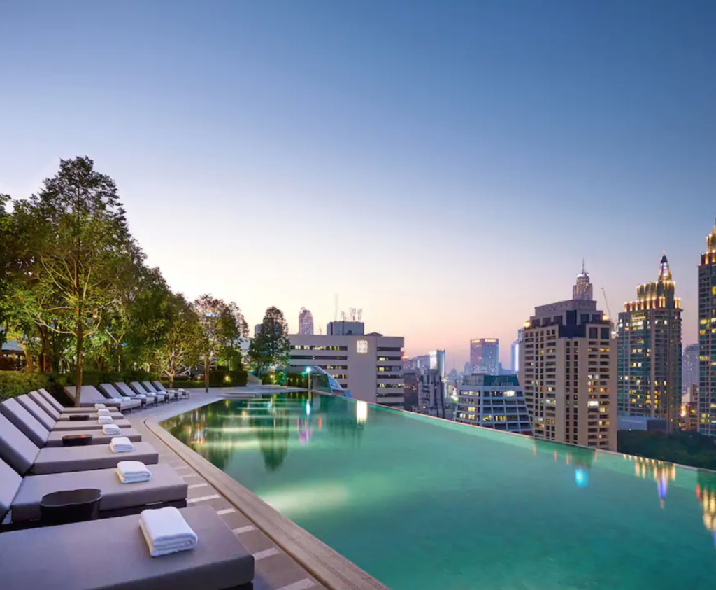 Best Bangkok Hotels featured by top US travel blog, Points with Q: image of Park Hyatt Bangkok Pool Dusk