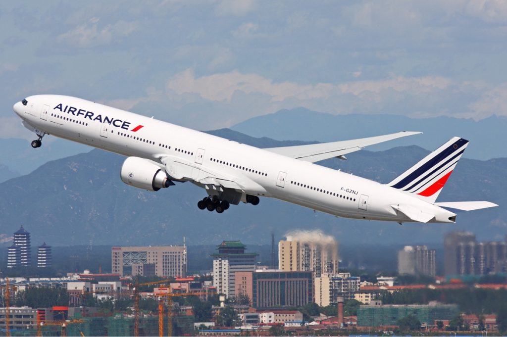 Paris Travel Guide featured by top US travel hacker, Points with Q: image of Air France Boeing 777-300ER Plane