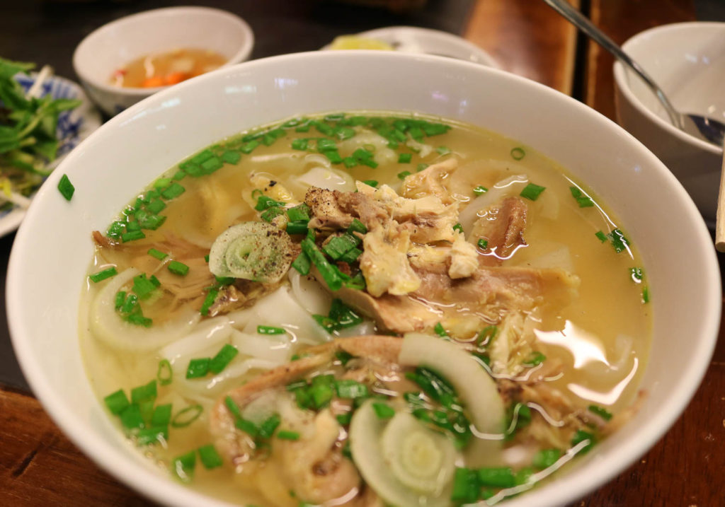 Vietnam Travel featured by top US travel blog, Points with Q: image of Chicken Pho Ho Chi Minh City Vietnam