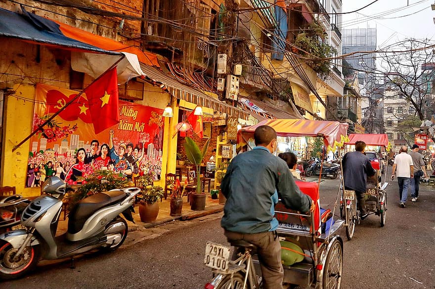 5 Best Ways to Korean Air SkyPass Miles featured by top US travel blog Points With Q, image: Hanoi Vietnam Rickshaw