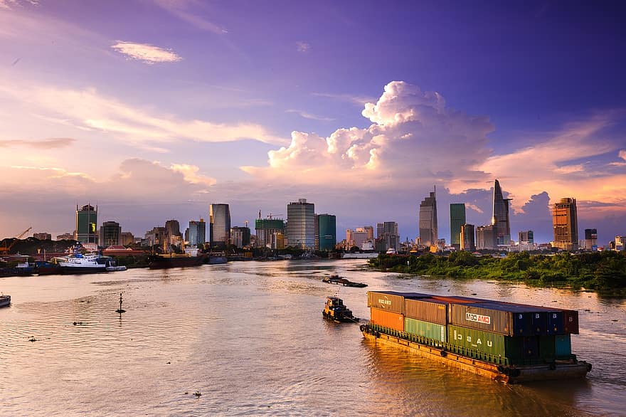 Vietnam Travel featured by top US travel blog, Points with Q: image of Ho Chi Minh City Vietnam Night Sunset