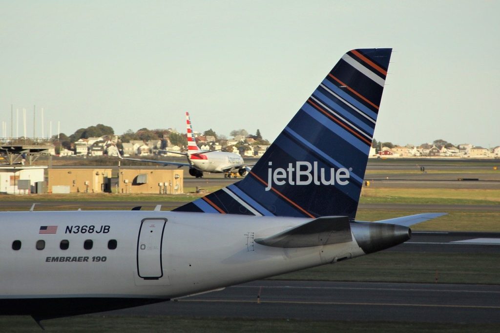 Nassau Bahamas Travel in 48 Hours: A Caribbean Vacation featured by top US travel blog Points With Q, image: JetBlue Airways Tail