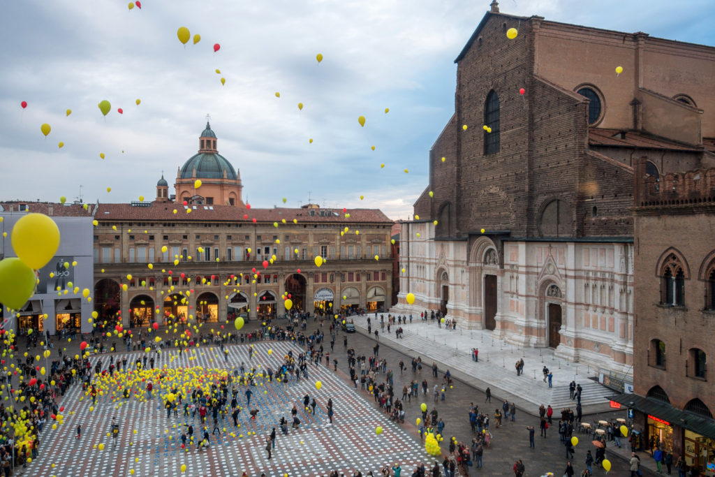 The Ultimate 48-Hour Bologna Italy Travel Guide featured by top US travel blog Points With Q, image: Piazza Maggiore World Food Day 2015 Bologna Italy