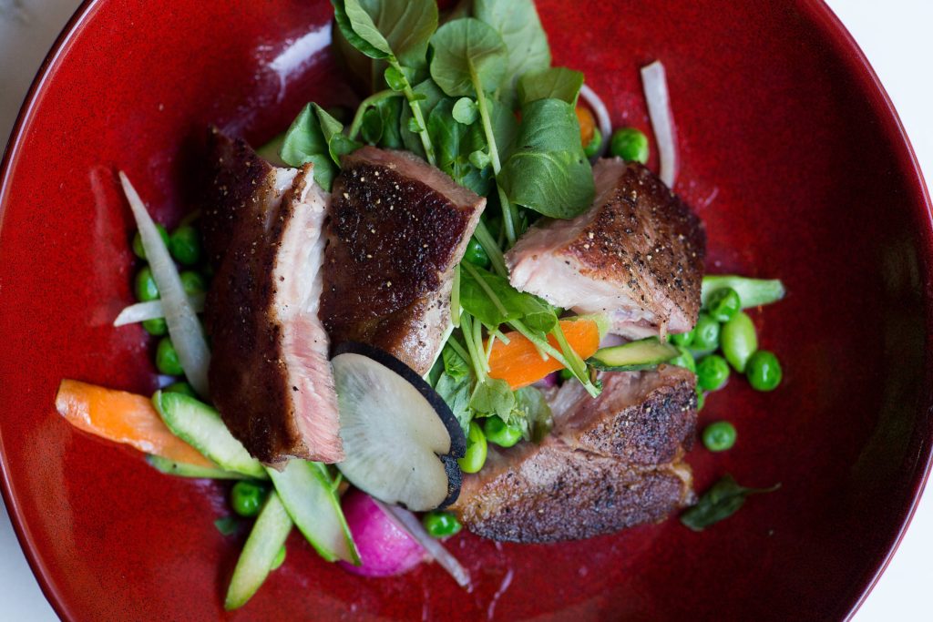 Best Things to do in Portland Maine in 48 Hours featured by top US travel blog Points With Q, image: UNION Restaurant Roast Pork Portland Maine The Press Hotel