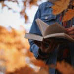 a person holding a book in their hands