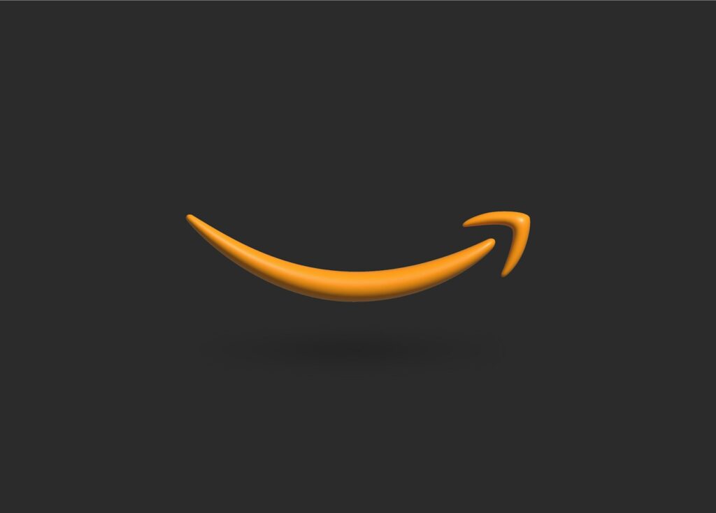 Amazon Flywheel an orange smile on a black background