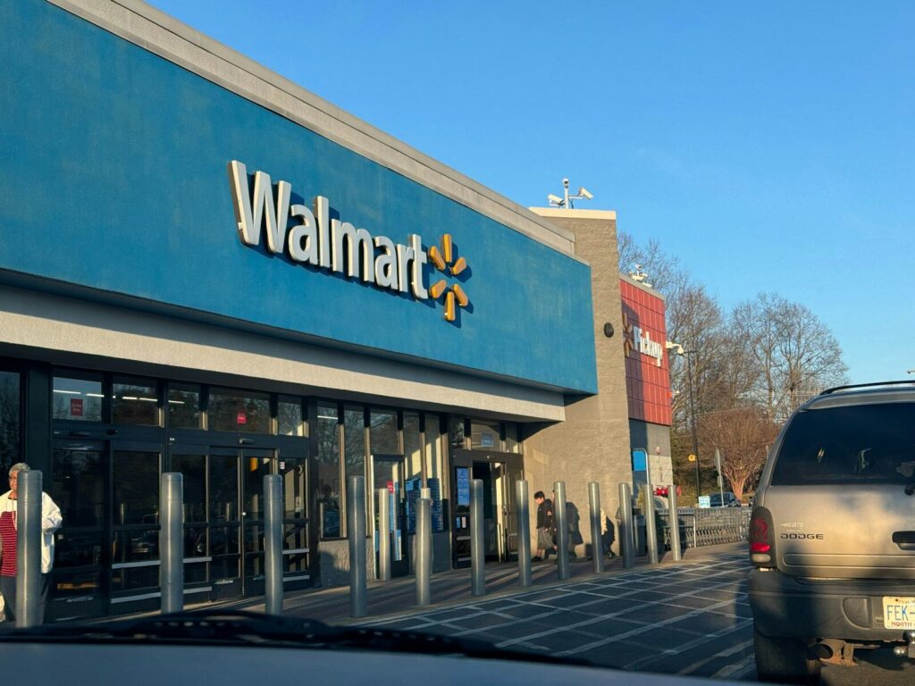 customer-first business strategy a walmart store with a car parked in front of it