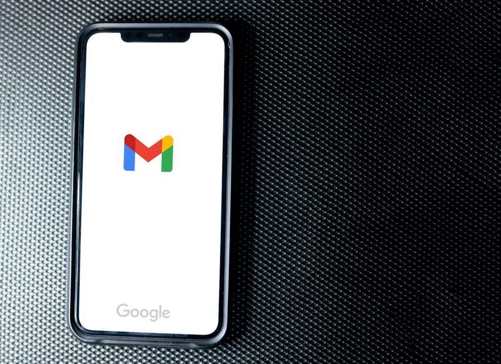 black samsung android smartphone on black textile